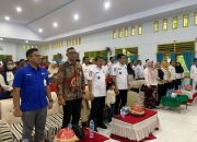 Bupati Erwin Burase Resmikan Program Jaminan Sosial Ketenagakerjaan bagi Pekerja Rentan